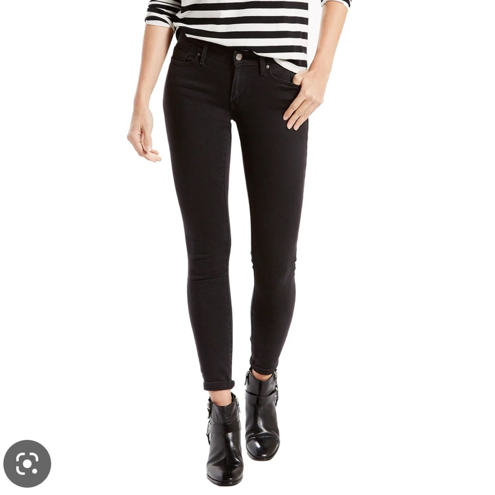 Levi’s black 711 mid rise skinny jeans